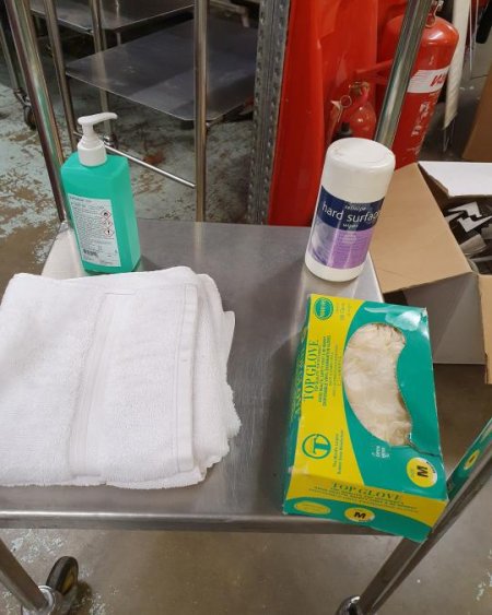 trolley dressing towels box of gloves wet wipes and sanitizer  