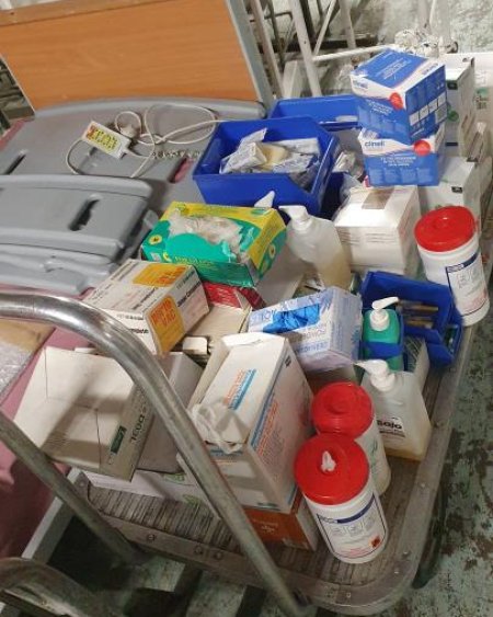 Qty dressing gloves, alco wipes, 3 unpacked sheets, 4 unpacked trays,gowns sanitizer gell 3 chem bottles