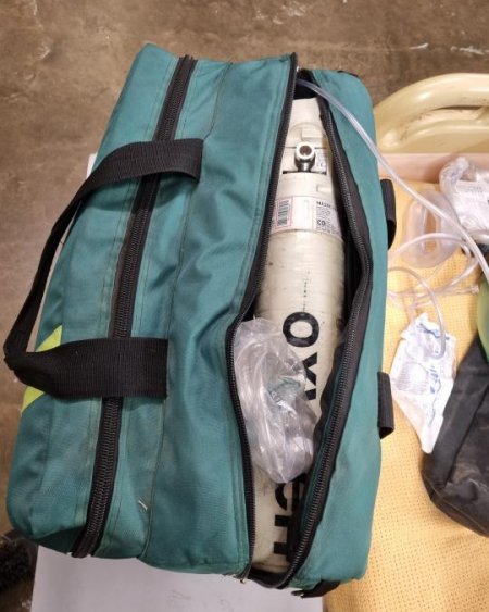 green Paramedic bag and oxygen tank 