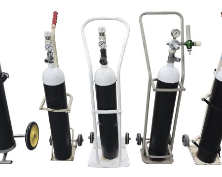 Group Of Period Oxygen Tanks With Trolley (Priced Seperately)