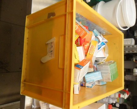 1 yellow crate with pills 